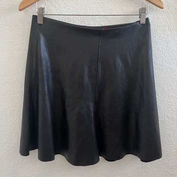 SPANX Dresses & Skirts - Spanx vegan leather flouncy mini skirt , SZ S
